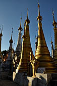 Inle Lake Myanmar. Indein, on the summit of a hill the  Shwe Inn Thein Paya a cluster of hundreds of ancient stupas. Many of them are ruined and overgrown with bushes.